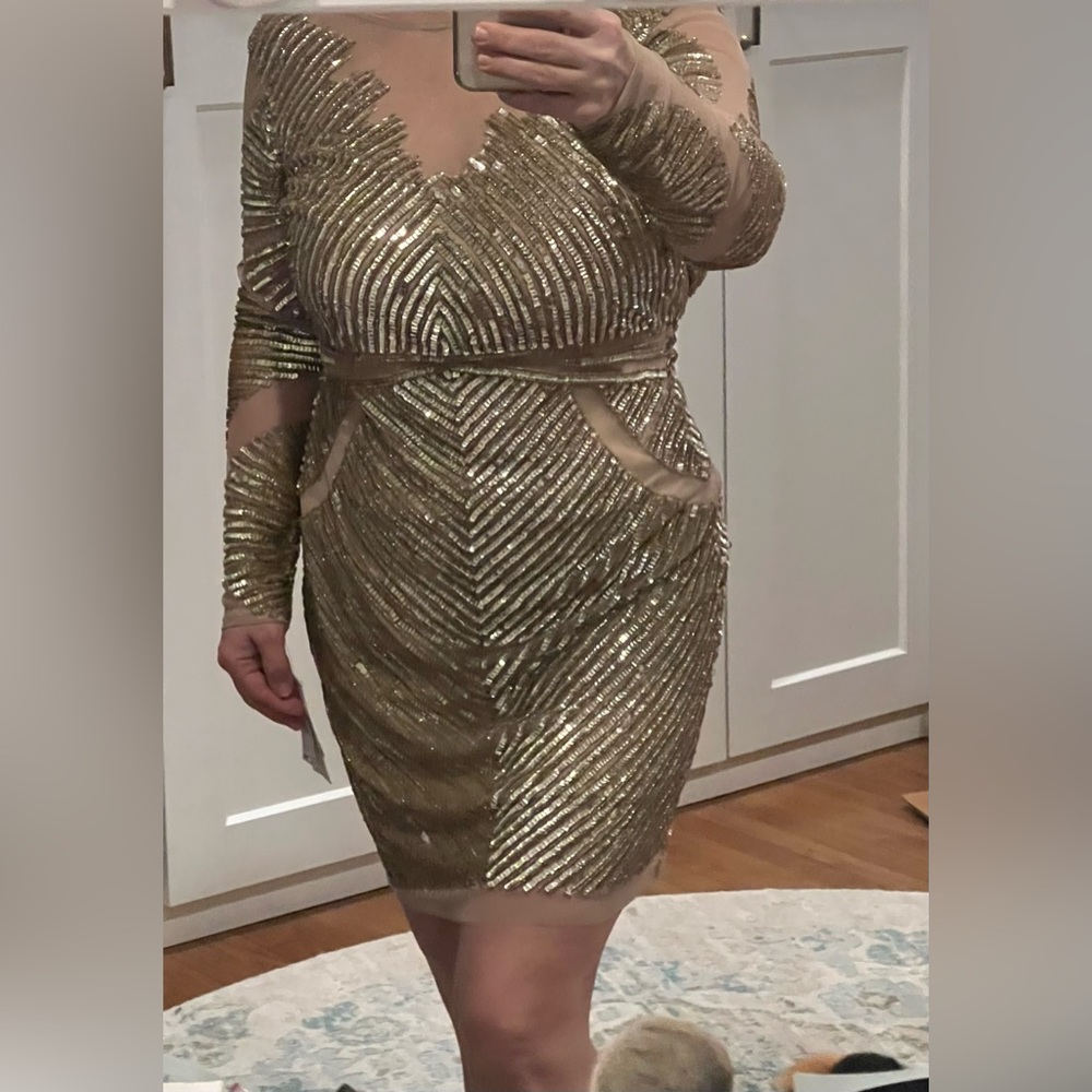 Dress is size 4. Color light gold. Aidan Mattox. I’m size 8.